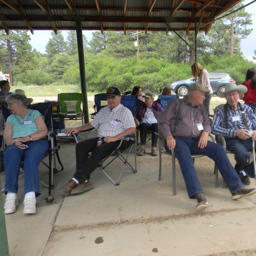 A group of people sitting.